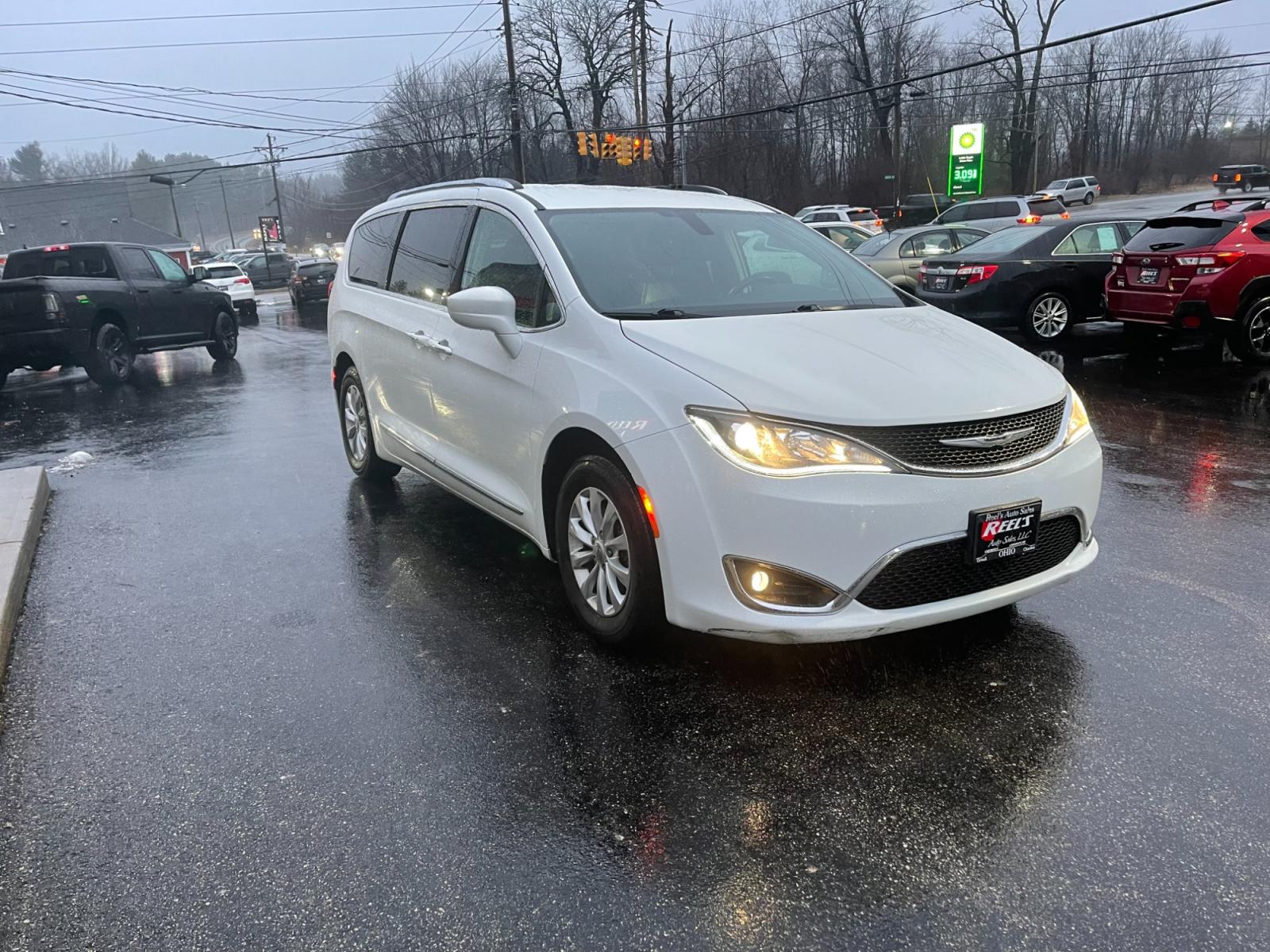 2018 White /Black Chrysler Pacifica Touring-L Plus (2C4RC1EG0JR) with an 3.6L V6 DOHC 24V engine, 9A transmission, located at 11115 Chardon Rd. , Chardon, OH, 44024, (440) 214-9705, 41.580246, -81.241943 - This 2018 Chrysler Pacifica Touring L Plus is a well-equipped minivan, boasting a single-owner history and a clean accident record. It features a capable 3.6L Pentastar V6 engine complemented by a 9-speed automatic transmission with start-stop technology to enhance fuel efficiency. The interior is a - Photo #2